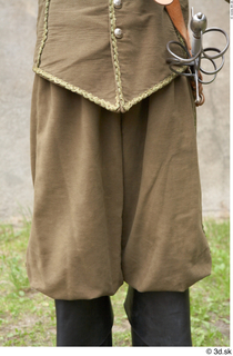  Photos Historical Musketeer in cloth armor 2 16th century Historical Musketeer Historical clothing brown trousers high leather shoes lower body 0002.jpg